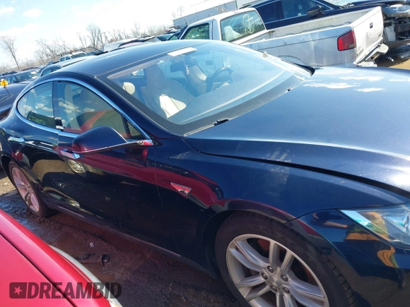 2013 Tesla Model S with VIN 5YJSA1CG2DFP14689, listed as a IAAI auction lot 41648508 with 98,578 mi miles and . Bid and sale history available at carsss.com. Image 12.