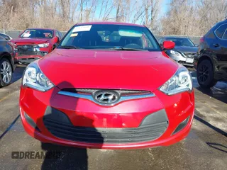 2016 Hyundai Veloster z VIN KMHTC6AD1GU260219, wystawiony jako IAAI lot #41114806 z przebiegiem 128 000 mil mil oraz . Historia ofert i sprzedaży dostępna na DreamBid. Obrazek 13.