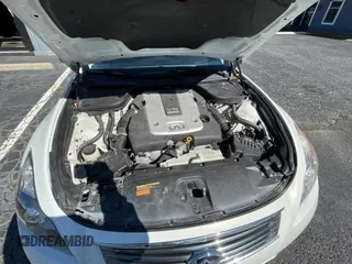 2014 Infiniti Q60 Journey with VIN JN1CV6EKXEM110777, listed as a Copart auction lot 45679495 with 128,241 mi miles and Clean title. Bid and sale history available at DreamBid. Image 7.