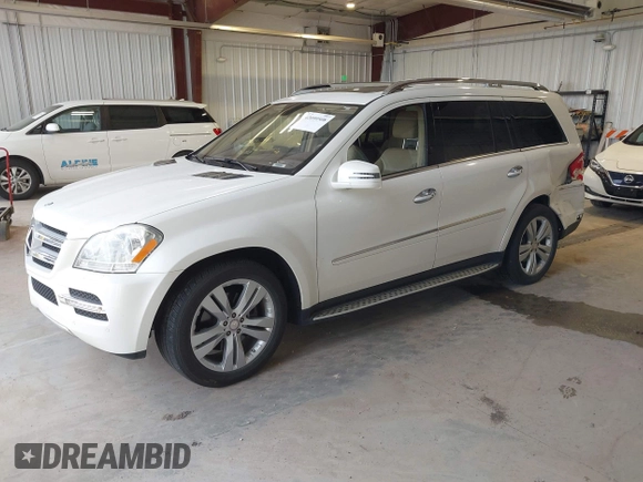 2011 Mercedes-Benz GL-Class GL 450 with VIN 4JGBF7BE9BA645344, listed as a IAAI auction lot 42099508 with 134,244 mi miles. Bid and sale history available at carsss.com. Image 2.
