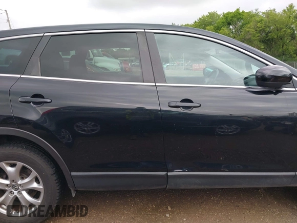 2015 Mazda CX-9 Sport with VIN JM3TB3BV1F0466070, listed as a IAAI auction lot 42350686 with 110,818 mi miles and . Bid and sale history available at DreamBid. Image 14.