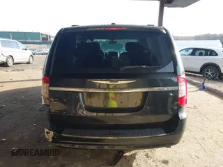 2012 Chrysler Town & Country Touring z VIN 2C4RC1BG2CR159420, wystawiony jako IAAI lot #41035284 z przebiegiem 142 529 mil mil oraz . Historia ofert i sprzedaży dostępna na DreamBid. Obrazek 17.