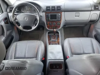 2000 Mercedes-Benz M 320/430/500 with VIN 4JGAB72E0YA167962, listed as a Copart auction lot 89158575 with 194,471 mi miles and Salvage title. Bid and sale history available at DreamBid. Image 8.