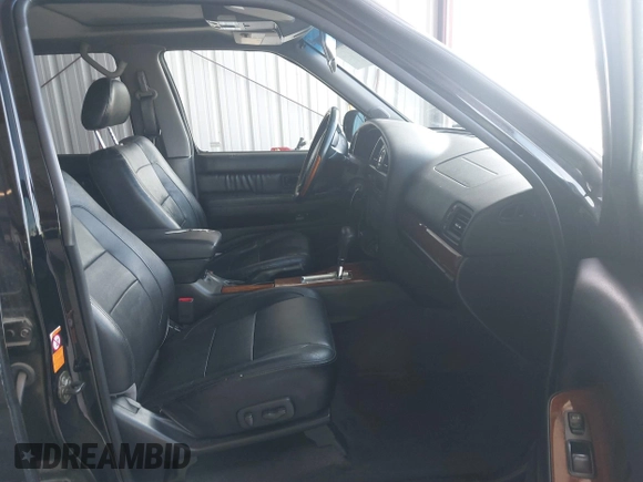 2002 Infiniti QX4 with VIN JNRDR09XX2W212458, listed as a IAAI auction lot 41770184 with 208,441 mi miles and . Bid and sale history available at DreamBid. Image 5.