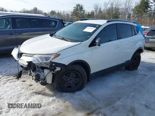 2017 Toyota RAV4 LE with VIN JTMBFREV1HJ146865, listed as a IAAI auction lot 41645327 with 142,191 mi miles. Bid and sale history available at carsss.com. Image 2.