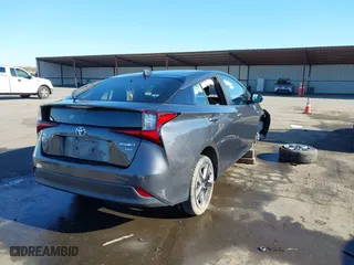 2020 Toyota Prius L Eco with VIN JTDKARFU5L3104460, listed as a IAAI auction lot 41298045 with 79,412 mi miles. Bid and sale history available at carsss.com. Image 4.