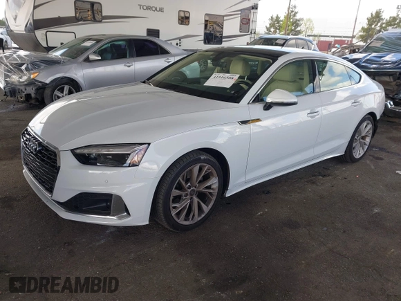 2023 Audi A5 Sportback Premium z VIN WAUABCF54PA052249, wystawiony jako IAAI lot #41916508 z przebiegiem 19 062 mil mil oraz . Historia ofert i sprzedaży dostępna na DreamBid. Obrazek 17.