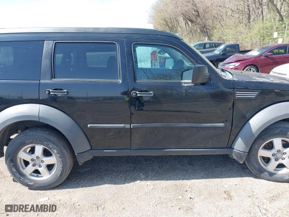 2007 Dodge Nitro SXT with VIN 1D8GU28K57W551957, listed as a IAAI auction lot 41914919 with 139,560 mi miles. Bid and sale history available at carsss.com. Image 13.