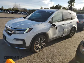 2020 Honda Pilot Touring 7-Passenger z VIN 5FNYF6H68LB002405, wystawiony jako Copart lot #46857625 z przebiegiem 69 617 mil mil oraz Szkoda całkowita • Salvage title. Historia ofert i sprzedaży dostępna na DreamBid. Obrazek 1.