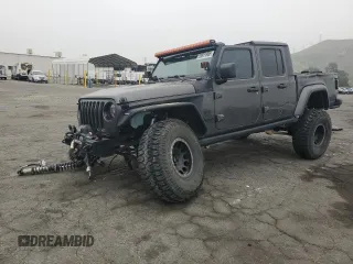 2023 Jeep Gladiator Freedom с VIN 1C6HJTAG2PL519578, выставлен на аукционе Copart как лот 53011865 с пробегом 41 914 миль миль и Списание • Salvage title. История ставок и продаж доступна на DreamBid. Изображение 1.