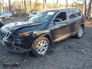 2015 Jeep Cherokee Latitude with VIN 1C4PJMCB3FW648891, listed as a IAAI auction lot 41065231 with 110,193 mi miles. Bid and sale history available at carsss.com. Image 2.