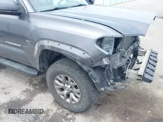 2017 Toyota Tacoma SR with VIN 5TFSX5EN9HX052395, listed as a IAAI auction lot 42290149 with 140,655 mi miles and . Bid and sale history available at DreamBid. Image 18.