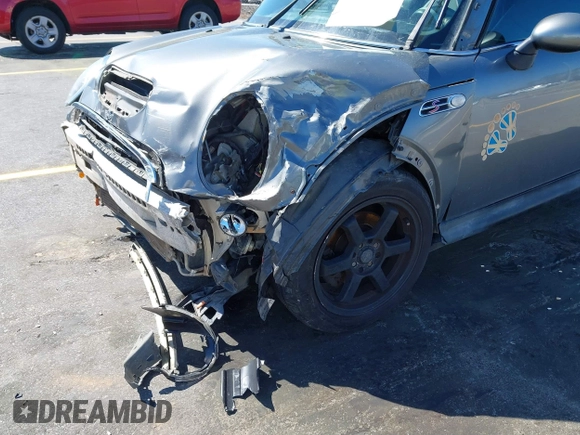 2005 MINI Convertible S with VIN WMWRH33545TF85051, listed as a IAAI auction lot 41843147 with 109,656 mi miles and . Bid and sale history available at DreamBid. Image 13.