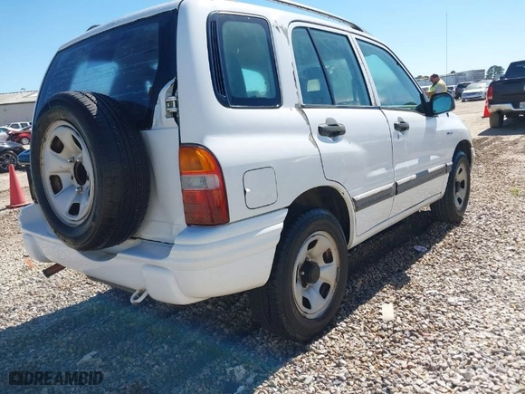 2002 Suzuki Vitara JLS with VIN 2S3TE52V726110298, listed as a IAAI auction lot 41791134 with 186,909 mi miles. Bid and sale history available at carsss.com. Image 4.