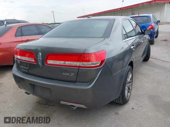 2012 Lincoln MKZ with VIN 3LNHL2GC5CR812108, listed as a IAAI auction lot 42656789 with 164,455 mi miles and . Bid and sale history available at DreamBid. Image 4.