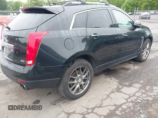 2013 Cadillac SRX Performance Collection z VIN 3GYFNHE39DS642111, wystawiony jako IAAI lot #42470291 z przebiegiem 176 239 mil mil oraz . Historia ofert i sprzedaży dostępna na DreamBid. Obrazek 4.