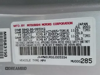 2002 Mitsubishi Montero XLS z VIN JA4MW31R02J005334, wystawiony jako Copart lot #79394064 z przebiegiem 285 949 mil mil oraz Czysty tytuł • Clean title. Historia ofert i sprzedaży dostępna na DreamBid. Obrazek 13.