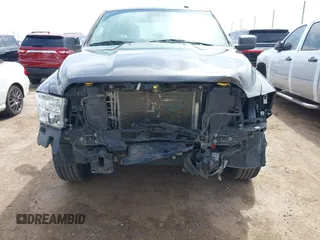 2021 Ram 1500 Tradesman z VIN 3C6RR6KG9MG563230, wystawiony jako IAAI lot #41905688 z przebiegiem 81 143 mil mil oraz . Historia ofert i sprzedaży dostępna na DreamBid. Obrazek 6.