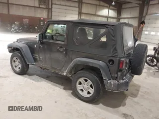 2014 Jeep Wrangler Sport with VIN 1C4AJWAG6EL167579, listed as a IAAI auction lot 41801276 with 137,639 mi miles and . Bid and sale history available at DreamBid. Image 3.