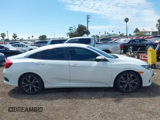 2019 Honda Civic Sport with VIN 2HGFC2F85KH600037, listed as a IAAI auction lot 42030526 with 82,821 mi miles and . Bid and sale history available at DreamBid. Image 13.