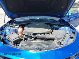2018 Chevrolet Camaro 1LT z VIN 1G1FB1RS5J0101768, wystawiony jako IAAI lot #41990965 z przebiegiem 82 492 mil mil oraz . Historia ofert i sprzedaży dostępna na DreamBid. Obrazek 10.