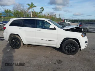 2022 Jeep Grand Cherokee WK Laredo X with VIN 1C4RJFAG8NC150575, listed as a IAAI auction lot 41198543 with 68,361 mi miles. Bid and sale history available at carsss.com. Image 13.