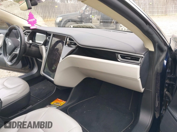 2014 Tesla Model S 60 with VIN 5YJSA1S12EFP42605, listed as a IAAI auction lot 40905031 with 68,155 mi miles and . Bid and sale history available at DreamBid. Image 5.