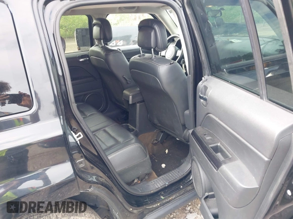 2015 Jeep Patriot High Altitude with VIN 1C4NJRFB9FD272192, listed as a IAAI auction lot 42621871 with 126,319 mi miles and . Bid and sale history available at DreamBid. Image 8.