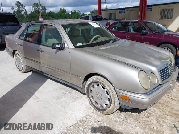 1998 Mercedes-Benz E 320 with VIN WDBJF25F5WA581878, listed as a IAAI auction lot 41662418 with 154,886 mi miles and . Bid and sale history available at DreamBid. Image 1.
