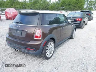 2011 MINI Hardtop S with VIN WMWSV3C50BTY10455, listed as a IAAI auction lot 42739230 with 54,998 mi miles and . Bid and sale history available at DreamBid. Image 4.