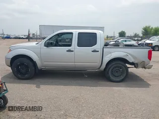 2011 Nissan Frontier Pro-4X with VIN 1N6AD0EV8BC434100, listed as a IAAI auction lot 42745419 with 264,222 mi miles and . Bid and sale history available at DreamBid. Image 14.