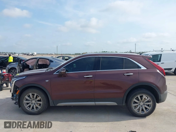 2023 Cadillac XT4 FWD Premium Luxury with VIN 1GYFZCR47PF106017, listed as a IAAI auction lot 42283401 with 40,734 mi miles and . Bid and sale history available at DreamBid. Image 14.