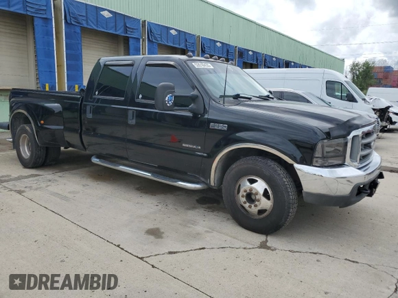 2001 Ford F-350 XL with VIN 1FTWW32F01EA68170, listed as a Copart auction lot 53516435 with 302,516 mi miles and Salvage title. Bid and sale history available at DreamBid. Image 4.