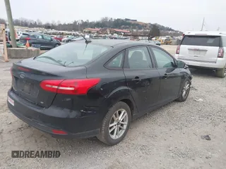 2017 Ford Focus SE with VIN 1FADP3F2XHL269548, listed as a IAAI auction lot 41304096 with 159,085 mi miles and . Bid and sale history available at DreamBid. Image 4.