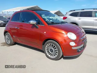 2012 FIAT 500 Gucci with VIN 3C3CFFER8CT370548, listed as a IAAI auction lot 42028846 with 74,091 mi miles. Bid and sale history available at carsss.com. Image 1.