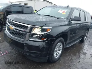 2019 Chevrolet Suburban LS with VIN 1GNSCGKC5KR321327, listed as a IAAI auction lot 41069977 with 282,308 mi miles and . Bid and sale history available at DreamBid. Image 2.