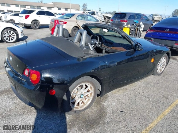 2004 BMW Z4 2.5i with VIN 4USBT33554LS52477, listed as a IAAI auction lot 41120153 with NaN miles. Bid and sale history available at carsss.com. Image 4.