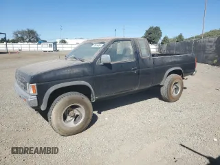 1991 Nissan Frontier SE with VIN 1N6HD16Y6MC410216, listed as a Copart auction lot 79554084 with 212,890 mi miles and Salvage title. Bid and sale history available at DreamBid. Image 1.