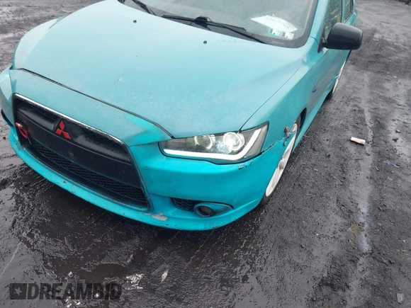 2013 Mitsubishi Lancer GT with VIN JA32U8FW6DU022878, listed as a IAAI auction lot 42449708 with 121,869 mi miles and . Bid and sale history available at DreamBid. Image 6.