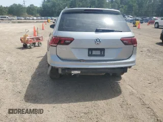 2021 Volkswagen Tiguan SE z VIN 3VV3B7AX9MM086196, wystawiony jako Copart lot #56989655 z przebiegiem 67 004 mil mil oraz Szkoda całkowita • Salvage title. Historia ofert i sprzedaży dostępna na DreamBid. Obrazek 6.