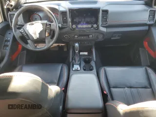 2023 Nissan Frontier Pro-4X z VIN 1N6ED1EK0PN610517, wystawiony jako Copart lot #87213324 z przebiegiem 51 648 mil mil oraz Szkoda całkowita • Salvage title. Historia ofert i sprzedaży dostępna na DreamBid. Obrazek 8.