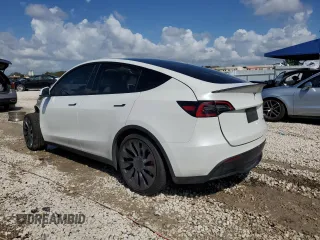 2023 Tesla Model Y Performance with VIN 7SAYGDEF0PF832570, listed as a Copart auction lot 51141415 with Not Provided miles and Non Repairable. Bid and sale history available at DreamBid. Image 2.