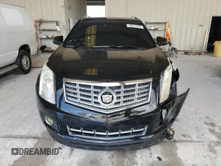 2015 Cadillac SRX Premium Collection z VIN 3GYFNDE38FS596718, wystawiony jako Copart lot #56674245 z przebiegiem 106 379 mil mil oraz Szkody całkowita. Historia ofert i sprzedaży dostępna na DreamBid. Obrazek 5.