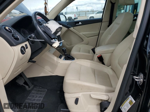 2012 Volkswagen Tiguan SE with VIN WVGAV7AX2CW535869, listed as a Copart auction lot 50589445 with 114,978 mi miles and Salvage Title. Bid and sale history available at DreamBid. Image 7.