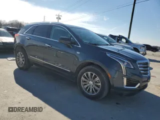 2019 Cadillac XT5 Luxury FWD with VIN 1GYKNCRS2KZ243074, listed as a Copart auction lot 44820955 with 49,299 mi miles and Salvage Title. Bid and sale history available at DreamBid. Image 4.