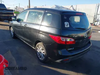 2014 Mazda 5 Sport with VIN JM1CW2BL1E0163682, listed as a IAAI auction lot 41344215 with 63,811 mi miles and . Bid and sale history available at carsss.com. Image 3.