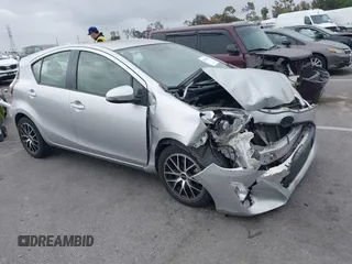 2015 Toyota Prius One z VIN JTDKDTB39F1090659, wystawiony jako IAAI lot #42096205 z przebiegiem 103 712 mil mil oraz . Historia ofert i sprzedaży dostępna na DreamBid. Obrazek 1.