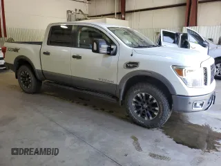 2017 Nissan Titan SV z VIN 1N6AA1E57HN569872, wystawiony jako Copart lot #53254555 z przebiegiem 170 573 mil mil oraz Szkoda całkowita • Salvage title. Historia ofert i sprzedaży dostępna na DreamBid. Obrazek 4.