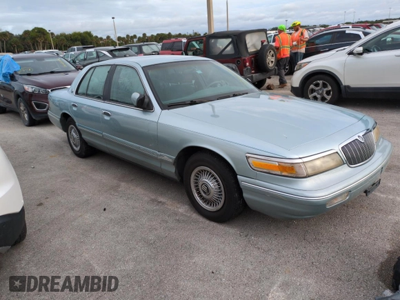 1996 Mercury Grand Marquis GS with VIN 2MELM74W5TX653873, listed as a Copart auction lot 74659254 with 86,589 mi miles and Salvage Title. Bid and sale history available at DreamBid. Image 4.