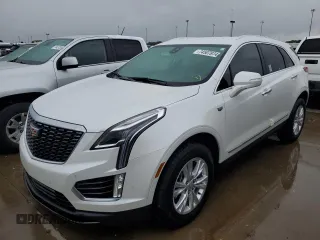 2022 Cadillac XT5 FWD Luxury z VIN 1GYKNAR48NZ163921, wystawiony jako Copart lot #74507874 z przebiegiem 5 723 mil mil oraz Nie do naprawy • Non repairable. Historia ofert i sprzedaży dostępna na DreamBid. Obrazek 1.